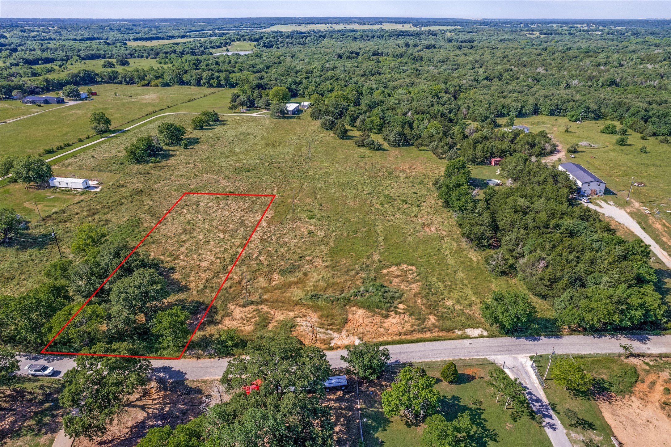 Property photo 01 of 9408 Dripping Springs Road, Denison, TX 75021 | MLS #21134647