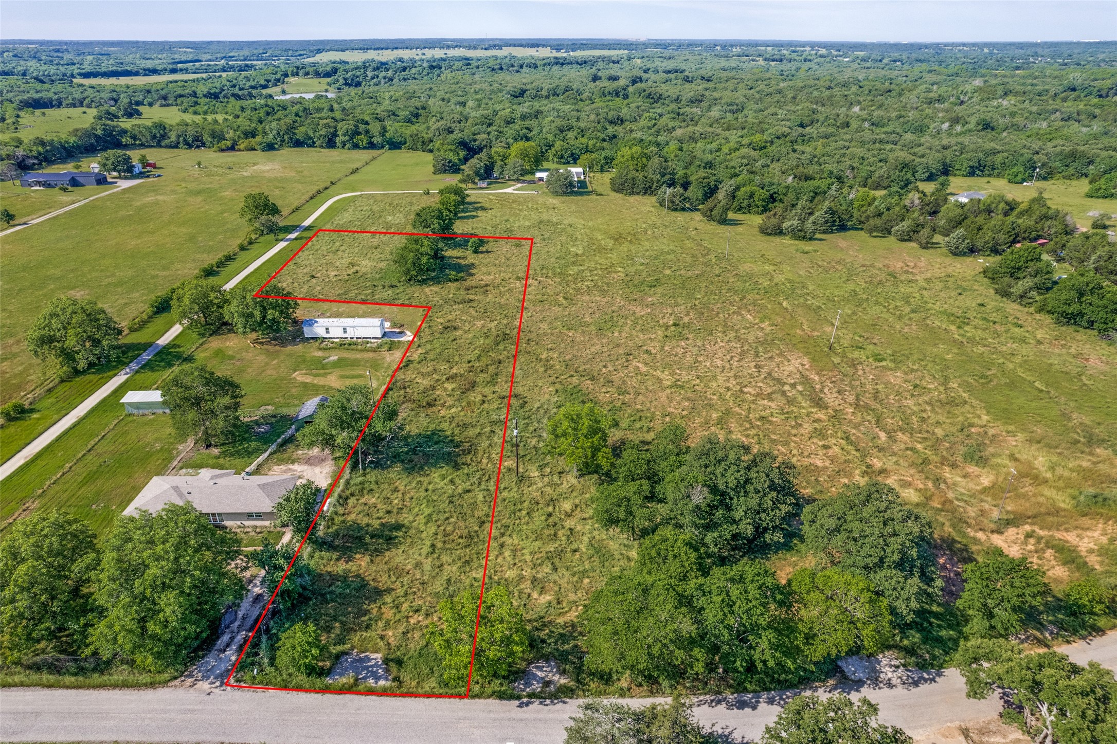 Property photo 01 of 9436 Dripping Springs Road, Denison, TX 75021 | MLS #21134678